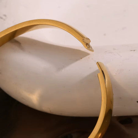 Gold Bracelet with hinged opening