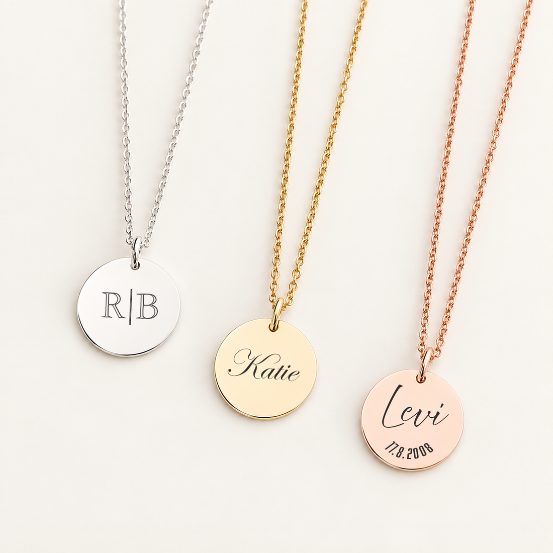 Personalised name necklaces in gold, rose gold and silver showing engraved names and initials
